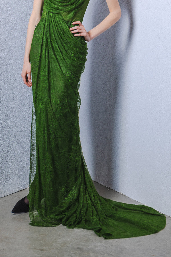 Draped lace gown with a softly sculpted silhouette and flowing train