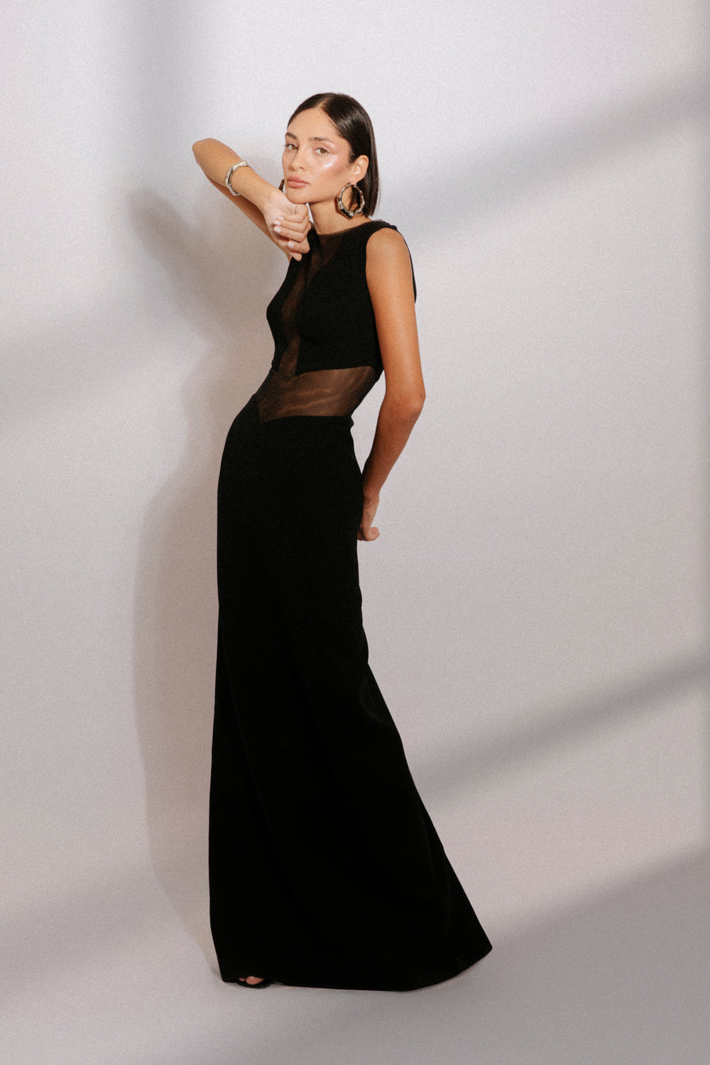 High neck crepe gown with bodice cut outs