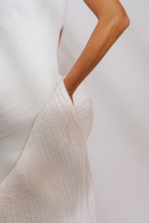 High neck crepe evening gown with taffeta wave detail