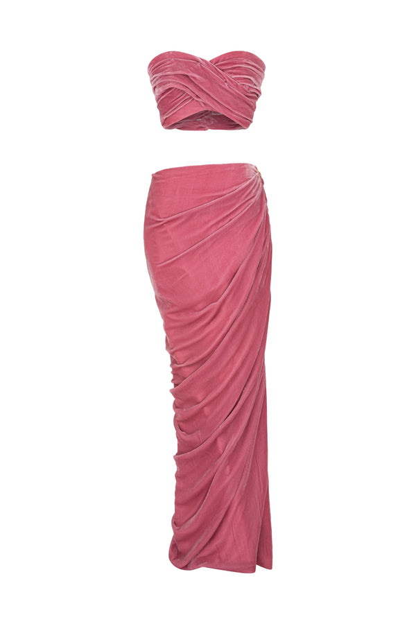 Corseted top paired with a draped skirt